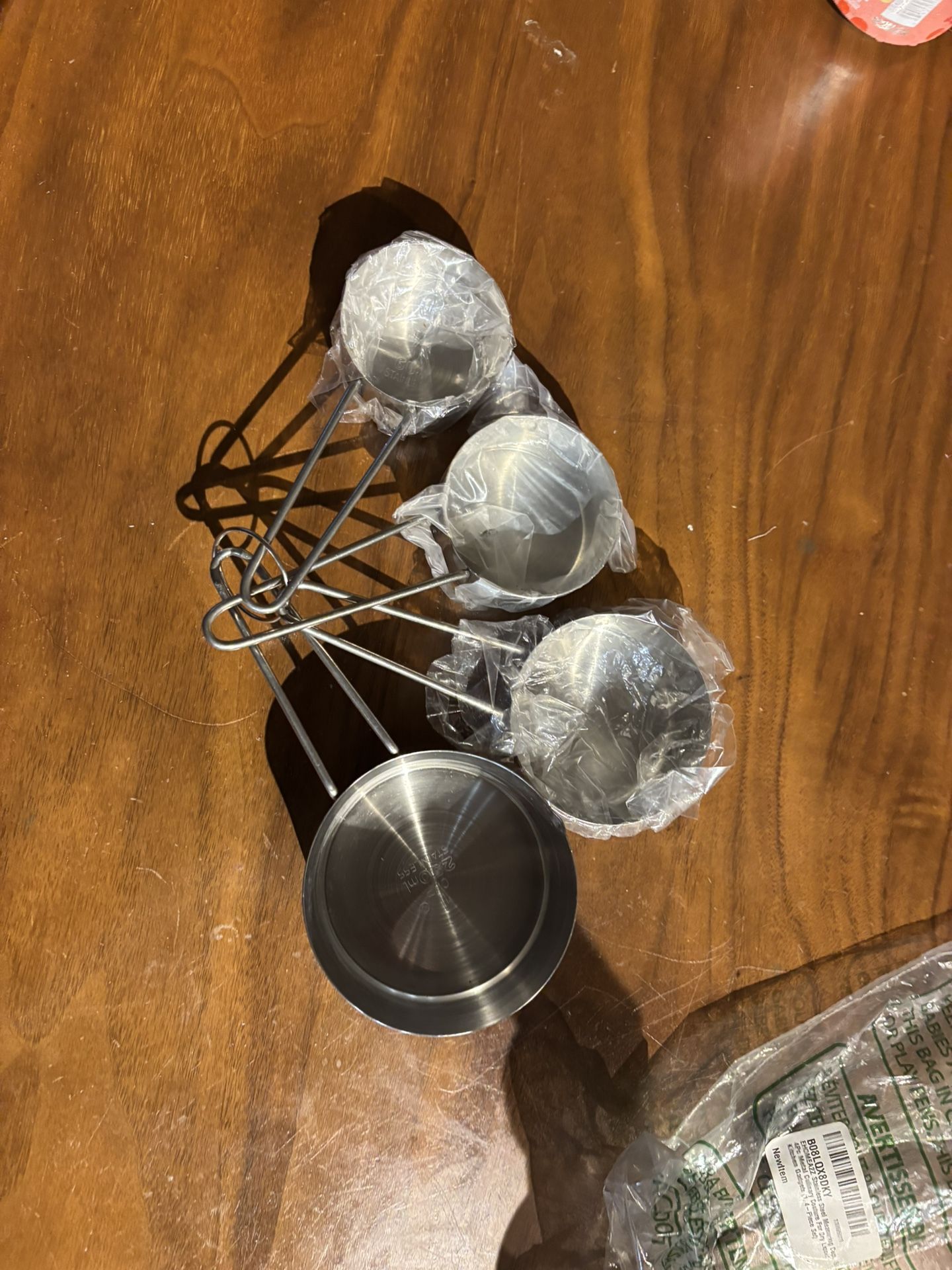 Stainless steel measuring cup and tablespoons