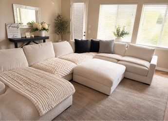 Practically New Ashley Furniture sectional couches w/ huge square ottoman with storage