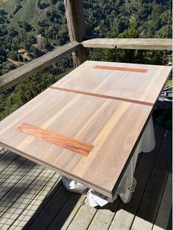 Refinished pedestal extendable dining table