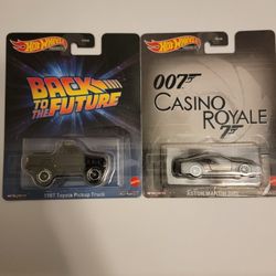 2023 HOT WHEELS Entertainment - Aston Martin DBS (James Bond Casino Royale)/  Back to the future Toyota 1987 Pickup