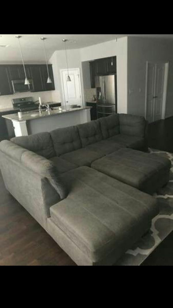 Ashley S Furniture Grey Sectional Couch With Ottoman For Sale In