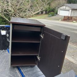 Locking Storage Cabinet or Bed  Stand 20.5 Deep 16” Wide 26.5 High on Rollers in Good Condition Great for Dorm Students 