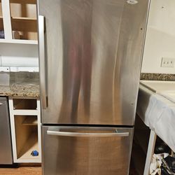 Whirpool Refrigerator And Above The Range Microwave 