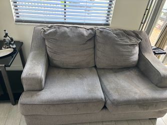 Two pieces of sofa , two end tables