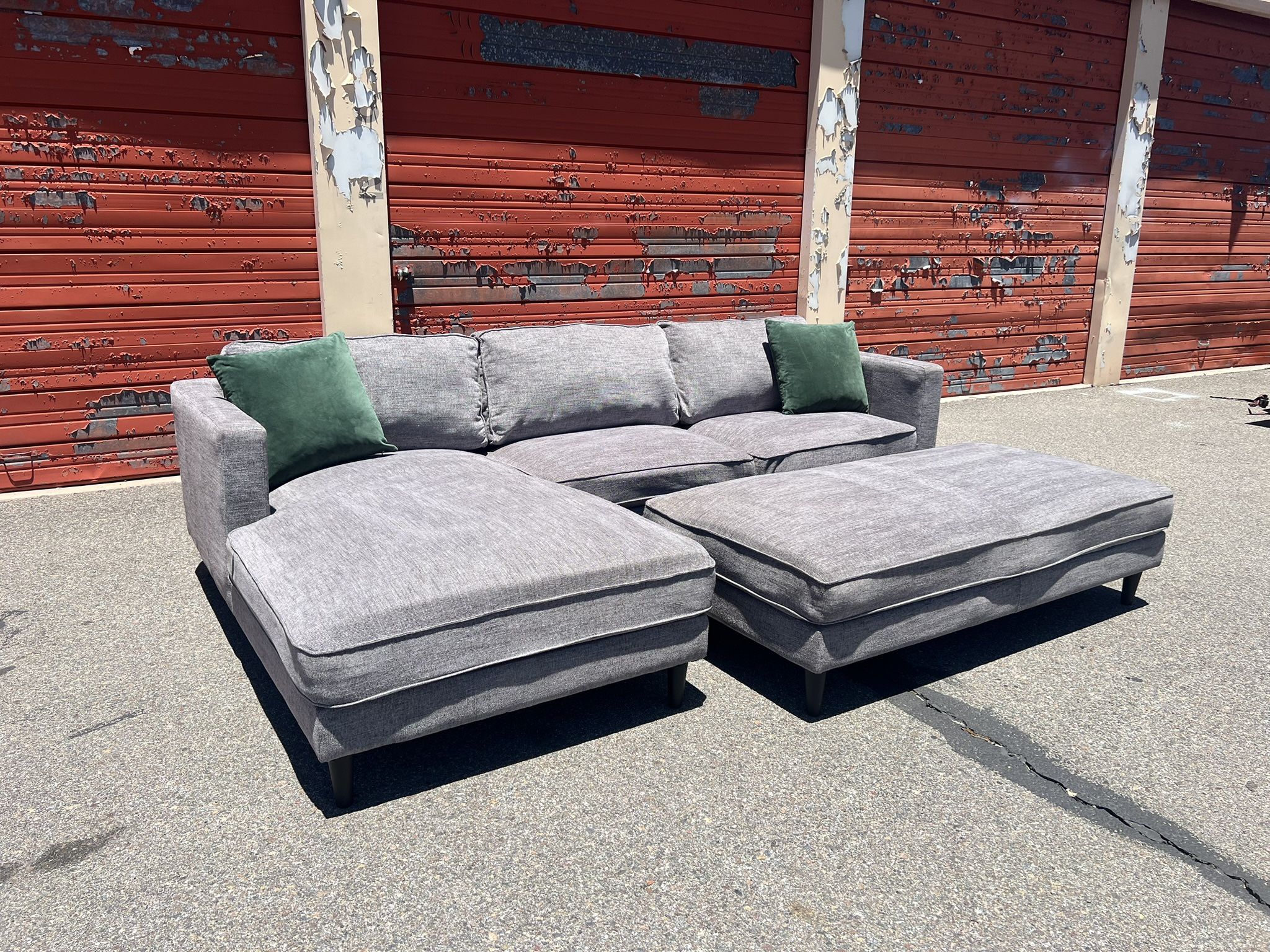 Living Spaces Gray Sectional Sofa Chaise With Ottoman