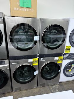 New open box LG WashTower Stacked SMART Laundry Center 4.5 Cu.Ft. Front Load Washer & 7.4 Cu.Ft. Gas Dryer in Graphite Steel