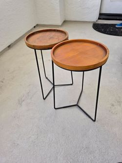 2 little wooden tables