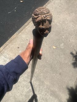 Old hand carved long walking stick