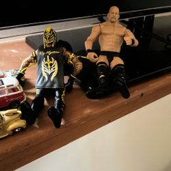Two Wrestling Figures