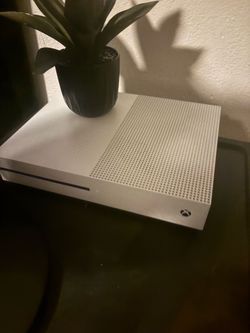 X box hardly  used