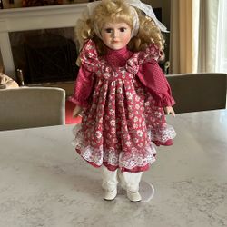 Porcelain  Doll In Red Dress