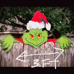 grinch over the fence 