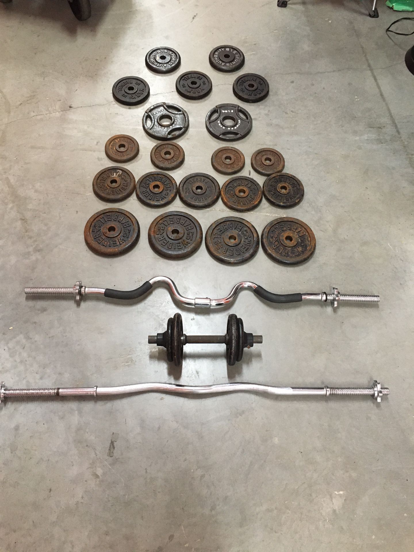 130 LBs Welder Barbell weights PLUS 3- Barbells. There are also a few York Weights
