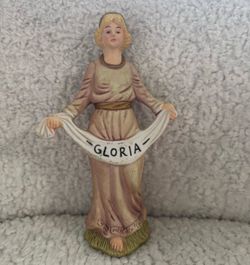 Angel figurine holding a banner with the word 'GLORIA' #angel #gloria Christmas decor statue