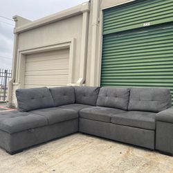 Living Spaces Gray 2 Piece Sectional Sleeper Couch
