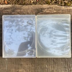 2 empty Playstation 3 game cases