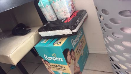 Diapers new born 1 and size 2