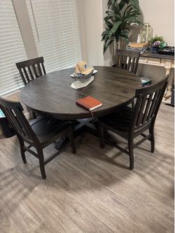 Ashley Furniture WOOD KITCHEN TABLE W LEAF AND (4) chairs