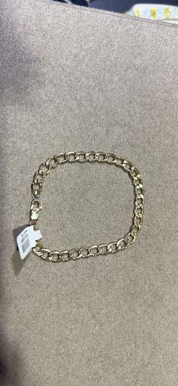 Gold curb bracelet