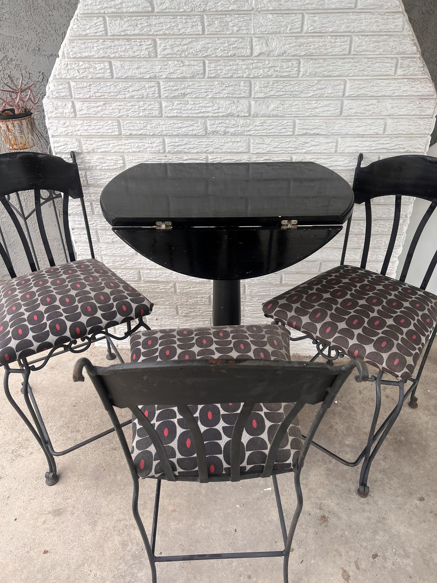 High Top Drop Leaf Table With Three Metal Chairs