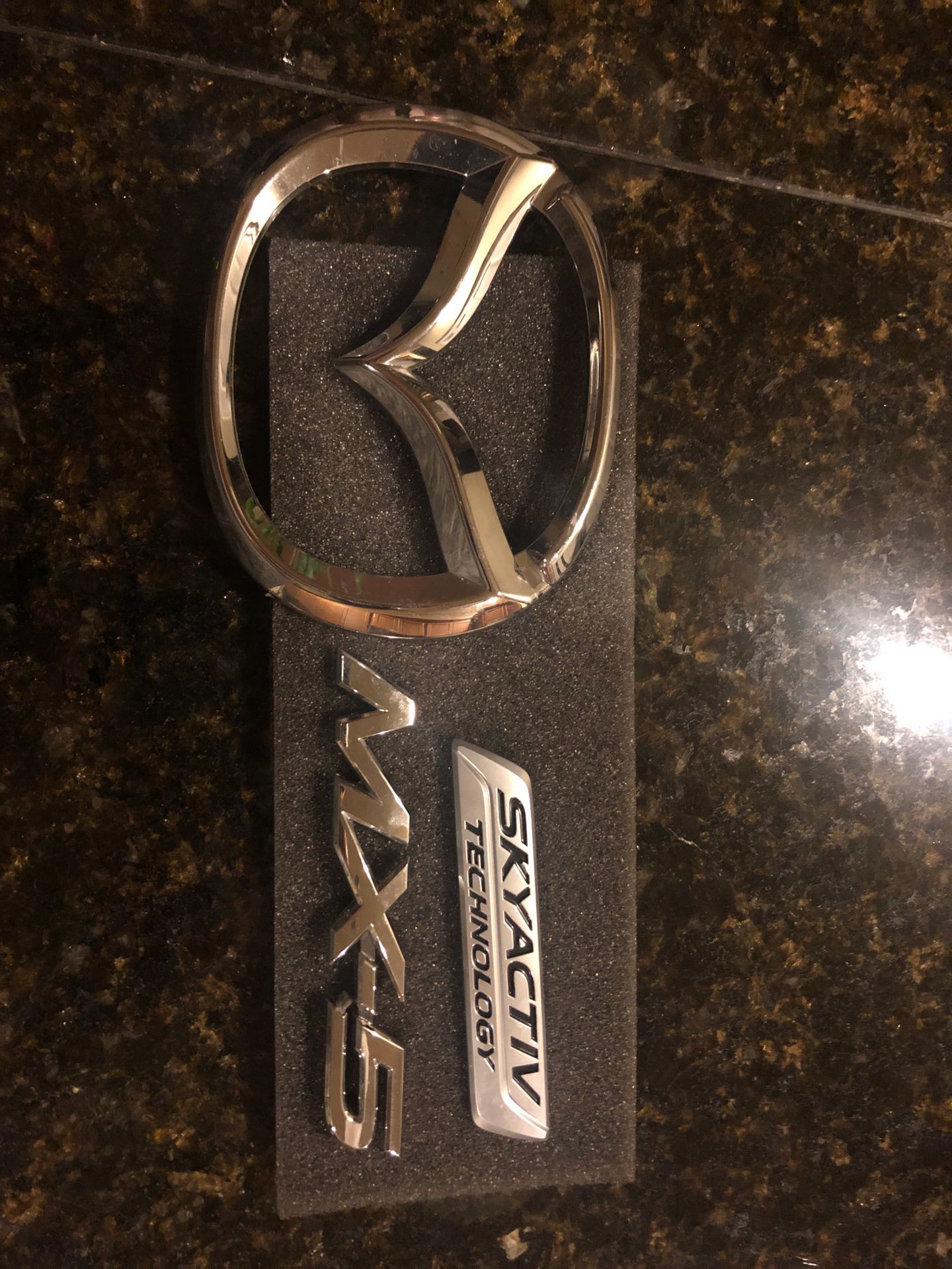 Mazda MX-5 emblem letters