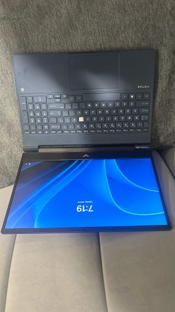 Used Victus laptop has some scratches and one key  is missing