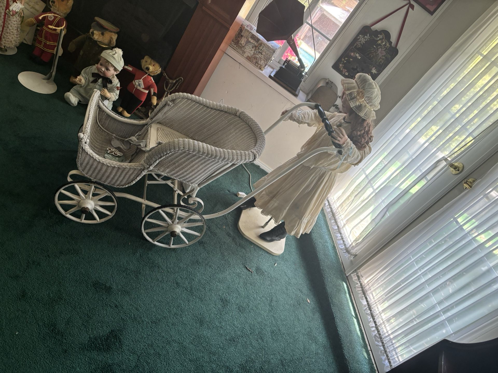 Antique doll and carriage