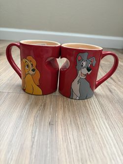New Disney Lady and the Tramp red mugs with heart-shaped cutout.