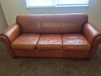 Brown leather couch go condition