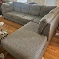 Gray Arrowmask 115” by 90” 2pc Modern Sectional Sofa with RAF Chaise by Living Spaces