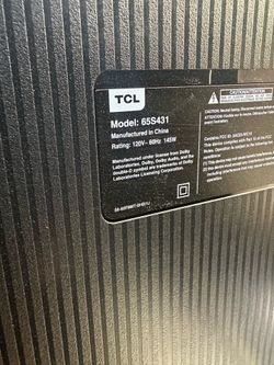 TCL Roku 65” smart Tv with a beautiful stand