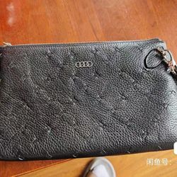 A wallet given as a gift when buying a car