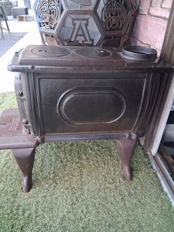 Very old wood burning cast iron ...