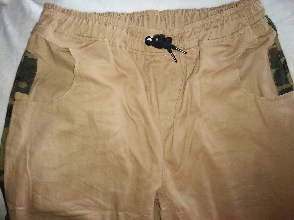 "A Sparkle Above" Khaki pants with with bits of camouflage. Checkout all my listings!)