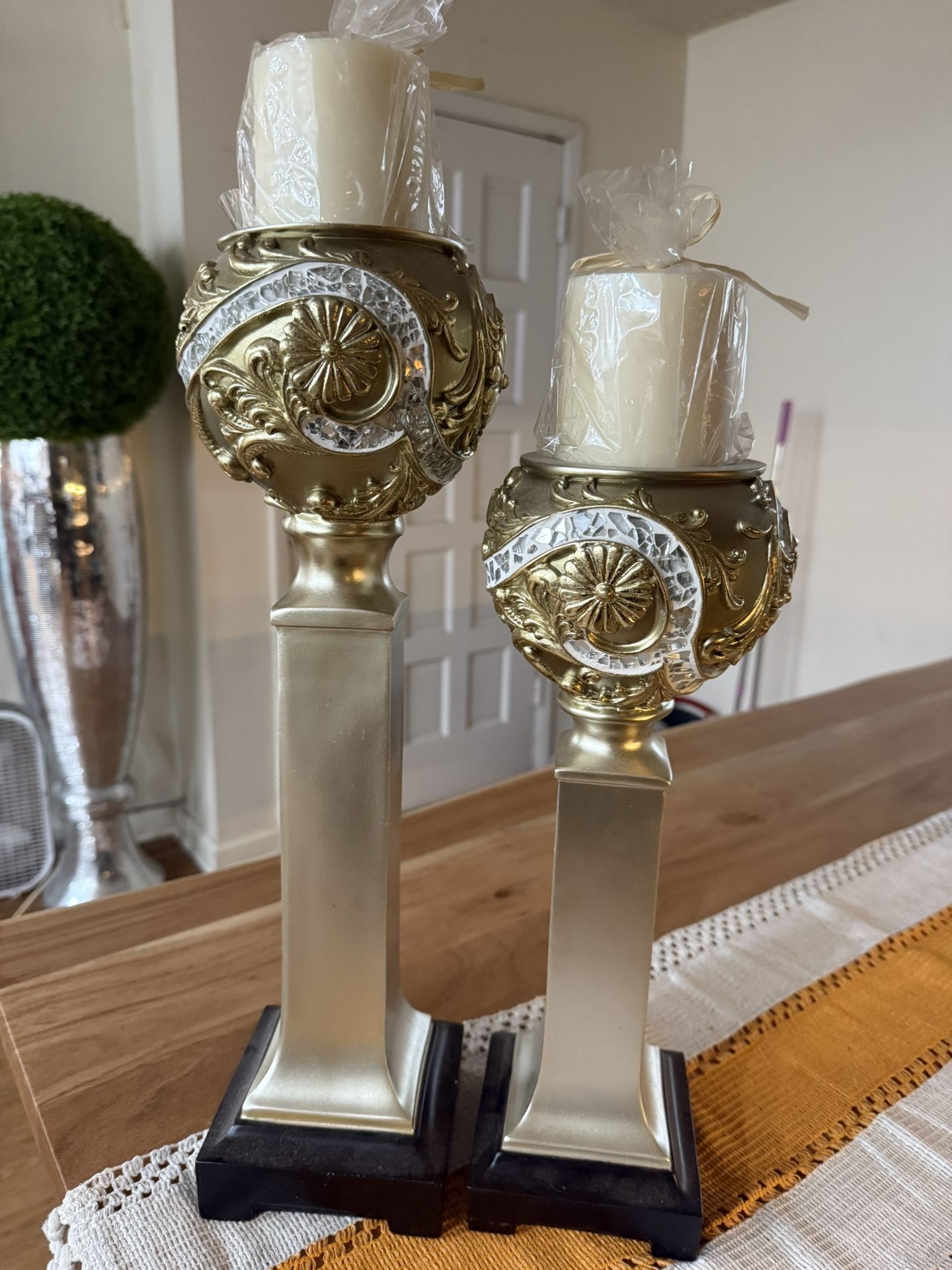 2 Beautiful Candle Holders With Candles.