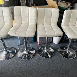 Set of 4 Quilted Faux Leather Adjustable Bar Stools