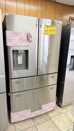 HUGE FOUR-DOOR STAINLESS STEEL REFRIGERATOR ON SALE