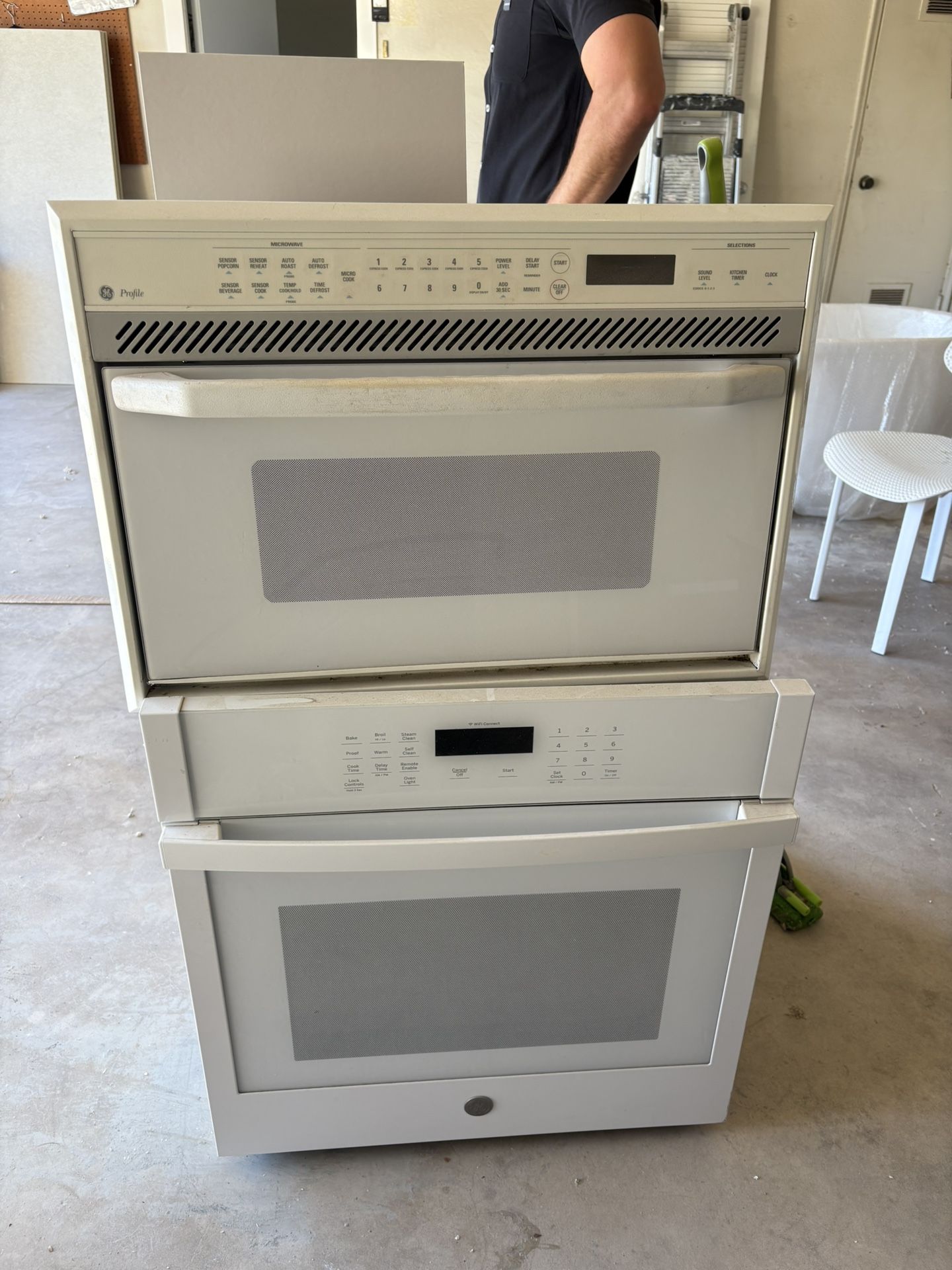 White GE wall Oven, Microwave And Warming Drawer