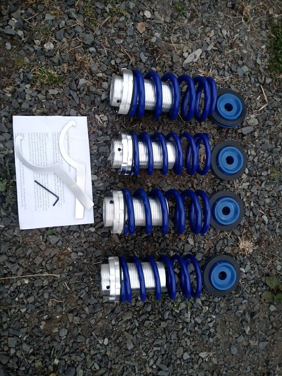 Brand new set of Bomz Racing coil-over adjustable lowering springs for struts up to 2" in diameter