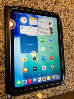 Apple iPad 10th generation 64gb Very good condition with leather case