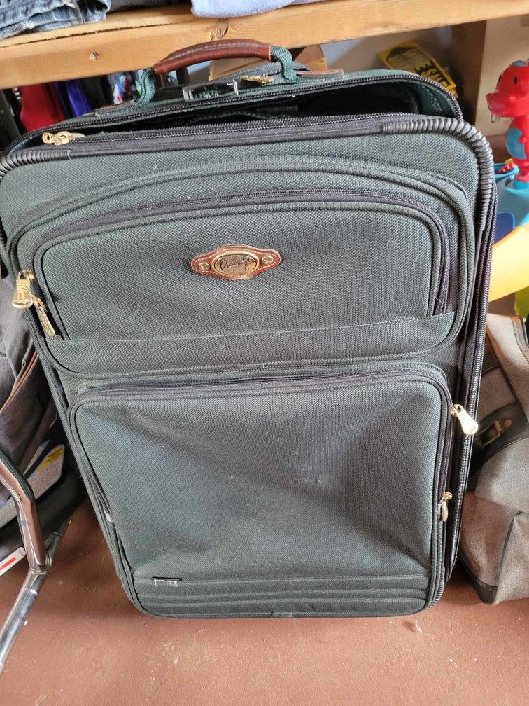Suitcases $15 Each.