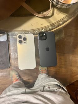 $880 Two Apple iPhones – Gold Pro and Black 14 pro and 15