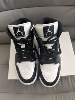 Air Jordan’s black & white hi-top women’s