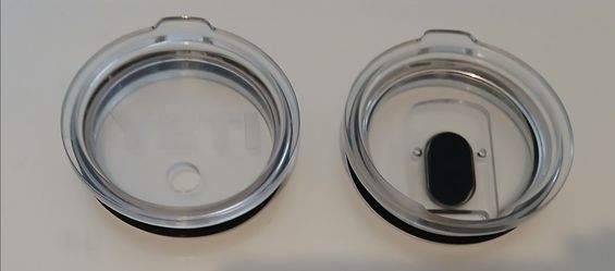 2 Yeti lids.  One is missing the straw and the other is missing the sliding thing.  Both for 20 oz tumblers.  $5 for both together