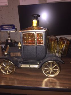 1915 Model T Whiskey Decanter w/6 shooters - plays music too!