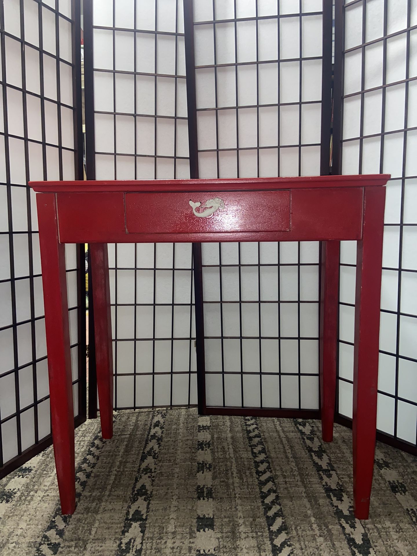 Bright red entry table