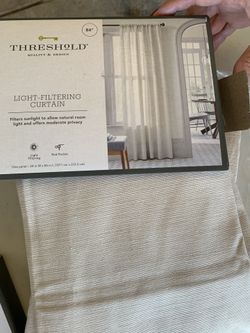 Threshold light filtering curtains.