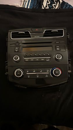 Original factory 2013 Nissan Altima center stack assembly