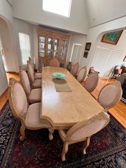 Beautiful blonde wood 9 foot dining table with China cabinet
