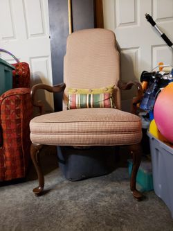 Cushioned, antique chair